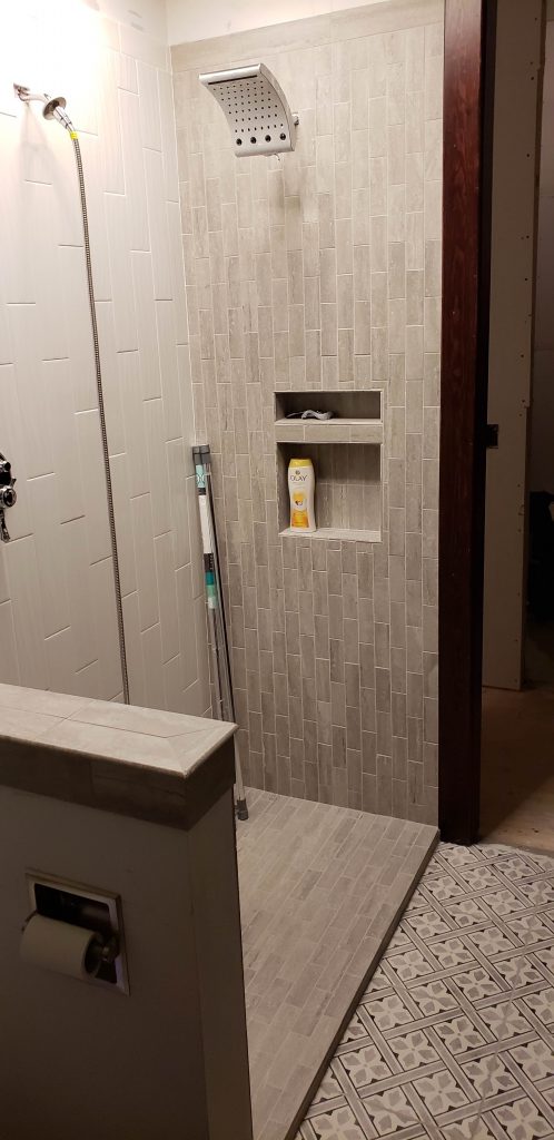 shower heads and new tile